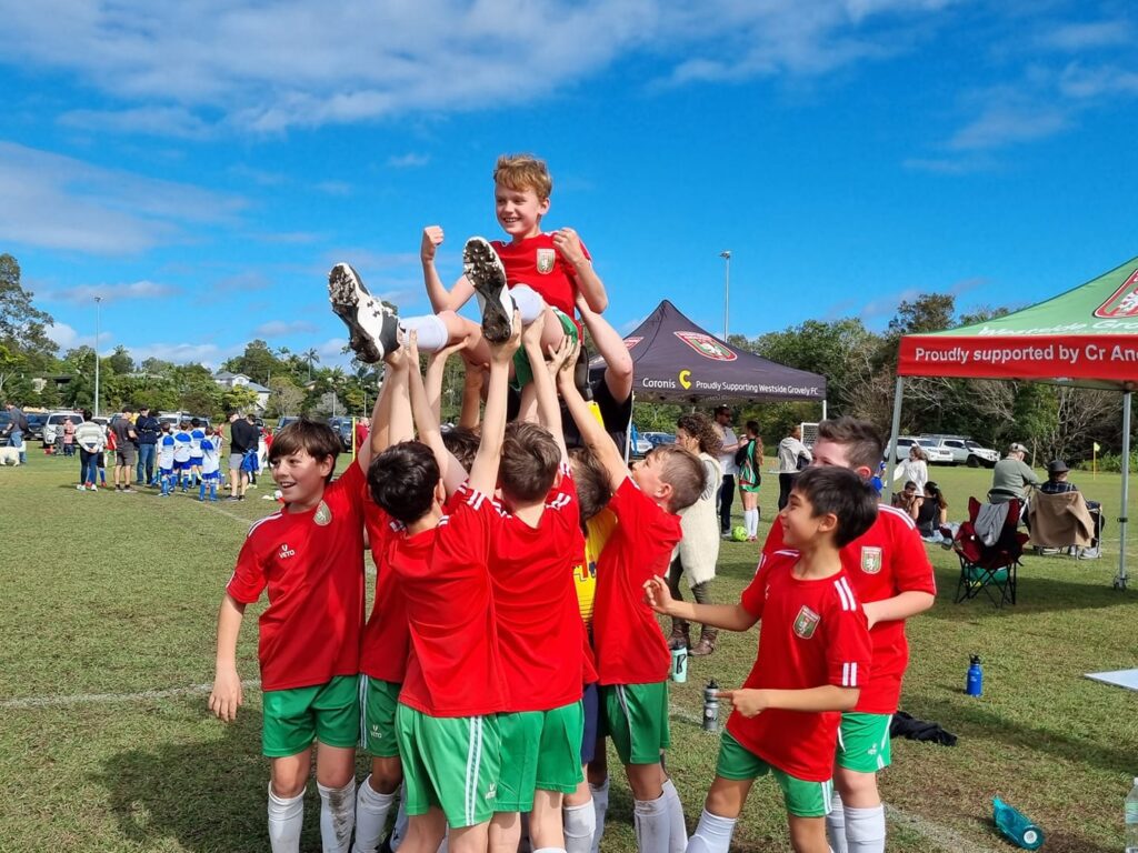 players cheering each other on as they prepare for the 2026 junior season at wgfc